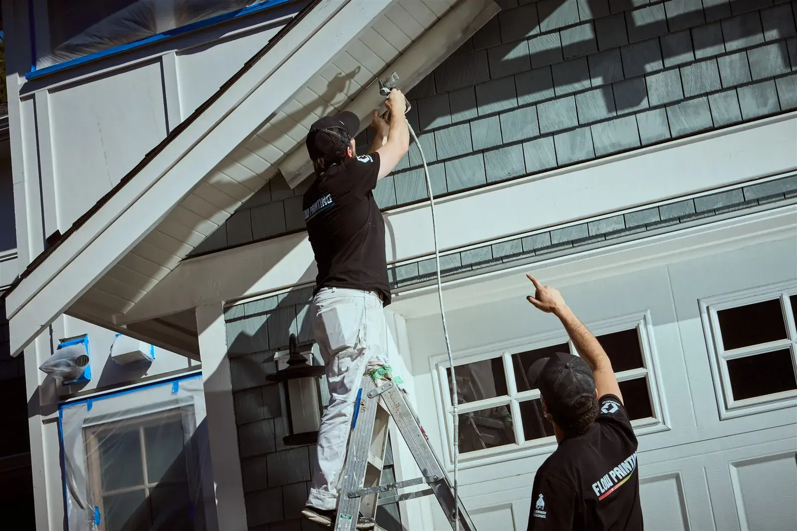 Flow Painting crew painting the exterior of a Victoria home